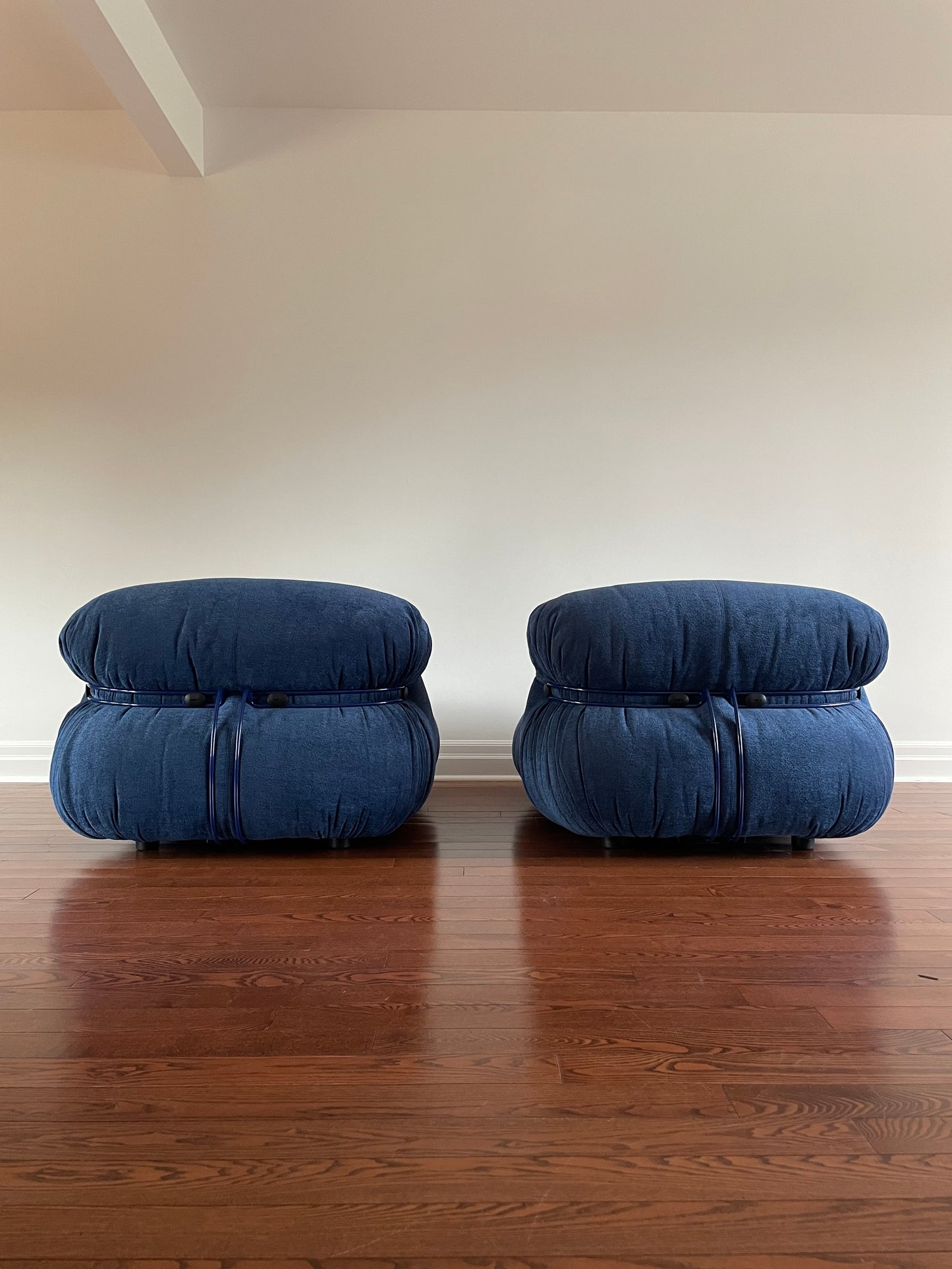 Soriana Armchairs with Pouf by Afra & Tobia Scarpa for Cassina.